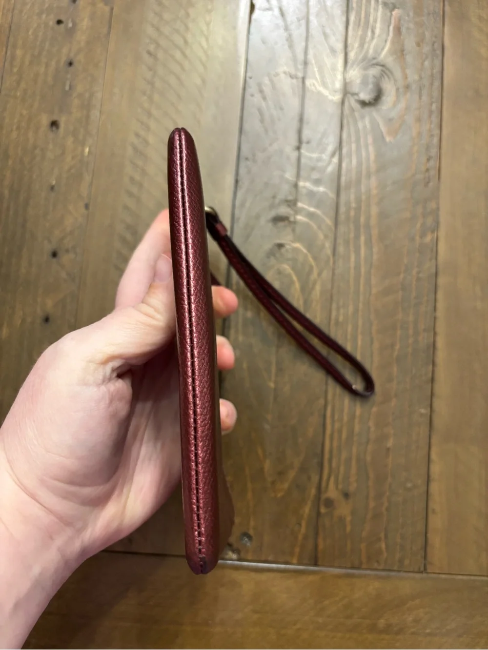 Coach Pebbled Leather Wristlet in Metallic Burgundy